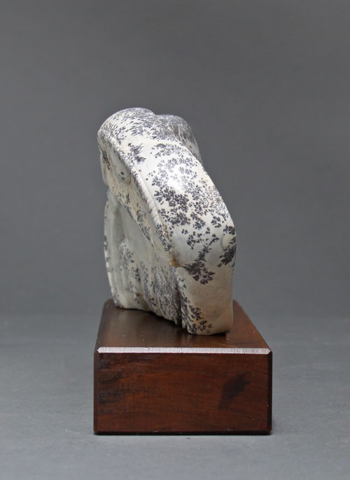 A side view of dendritic Soapstone Owl #20 by Clarence P. Cameron of Madison, Wisconsin