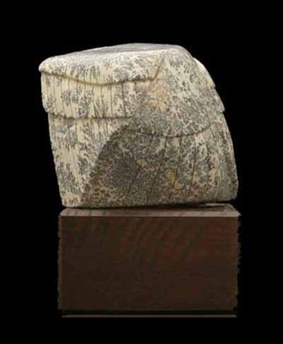 A side view of Soapstone Owl #14F by Clarence