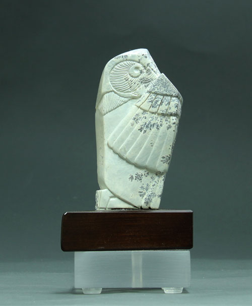 A frontal view of  Soapstone Owl #5 by Clarence P. Cameron