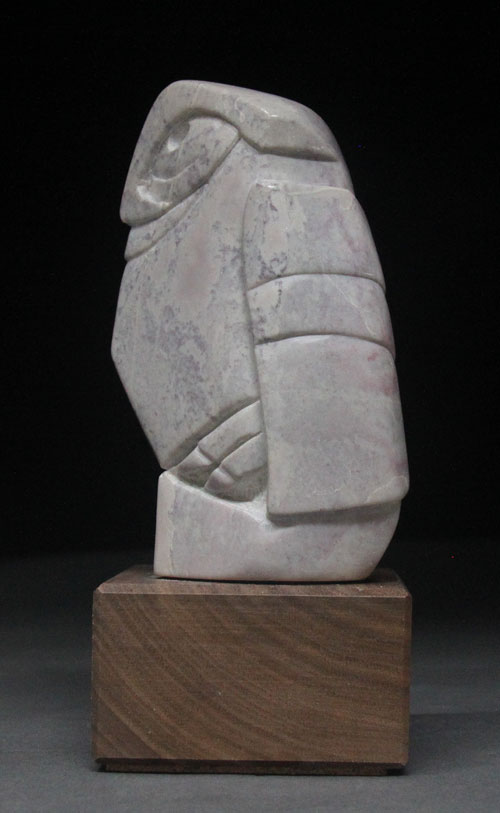 A side view of Soapstone Owl #19