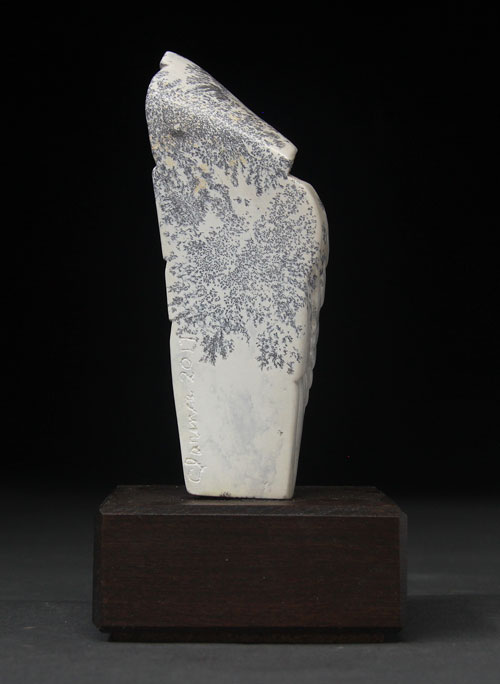 A side view of Soapstone Owl #25