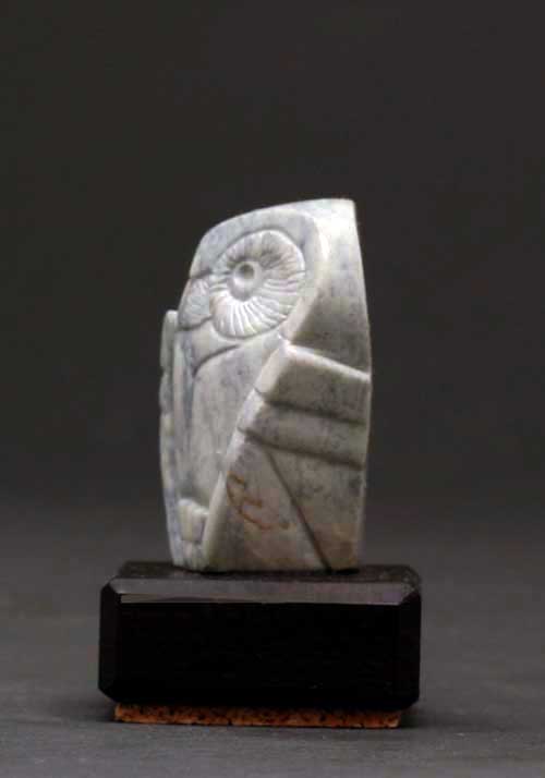 A side view of Soapstone Owl #19C