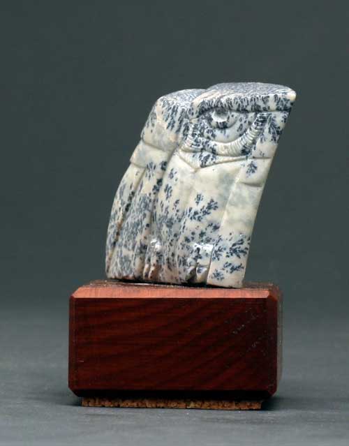 A side view of Soapstone Owl #21C by Clarence P. Cameron