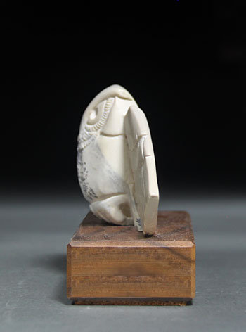 A side view of Soapstone Owl #12F