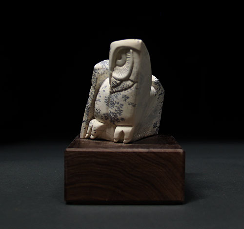 A side view of Soapstone Owl #3 by Clarence P. Cameron of Madison, WI 