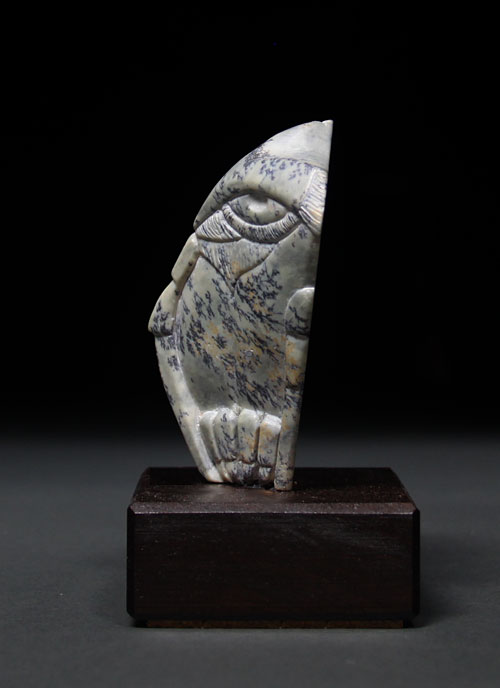 A side view of Soapstone Owl #15