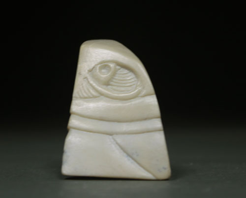 A side view of the dendritic Soapstone Owl #24 by Clarence P. Cameron of Madison, Wisconsin