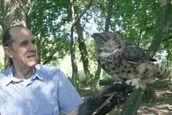 Clarence with Emily, a Great Horned Owl